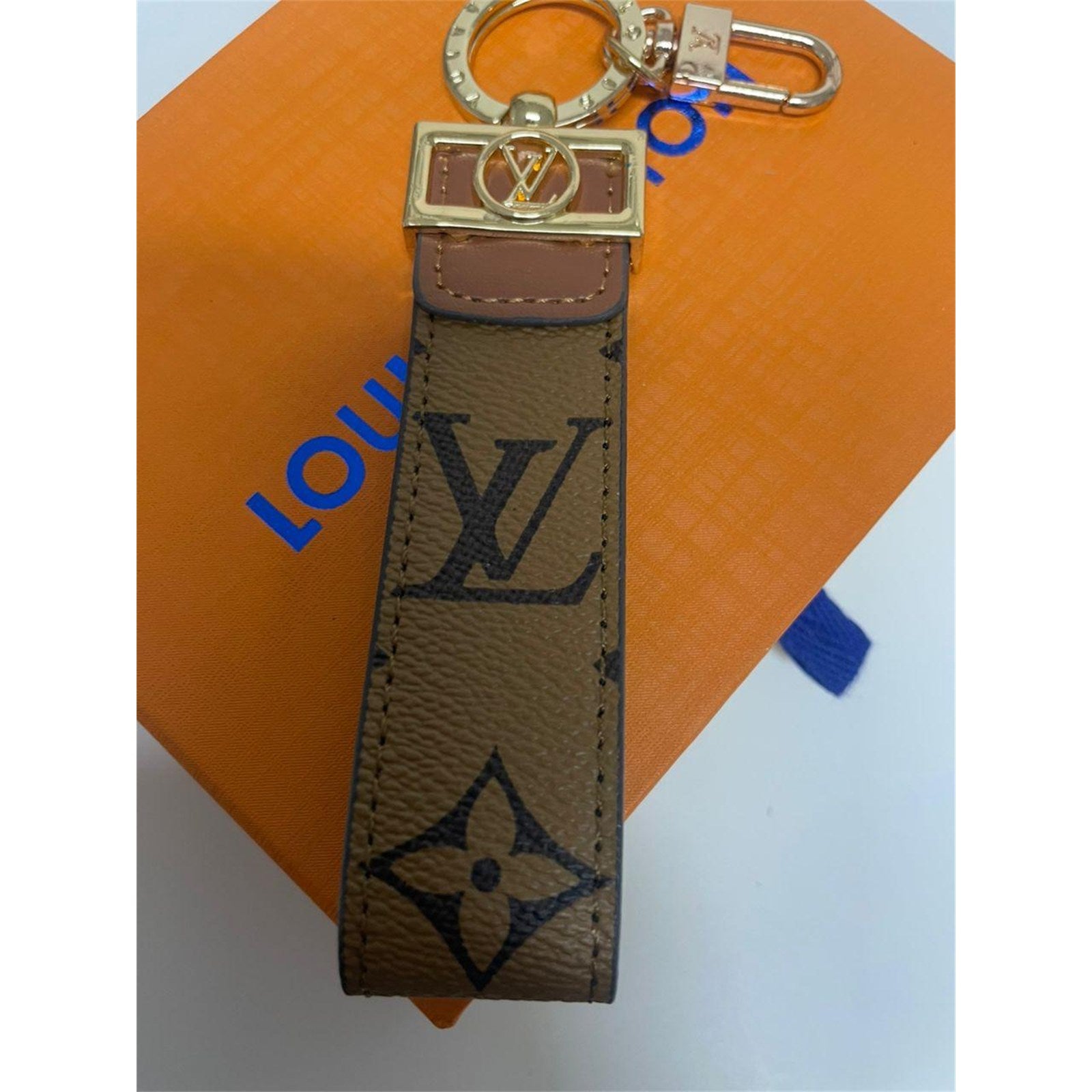 Louis Vuitton Dragonne Key Holder Reverse Monogram Brown with Dust Bag – Authentic Pre-Owned