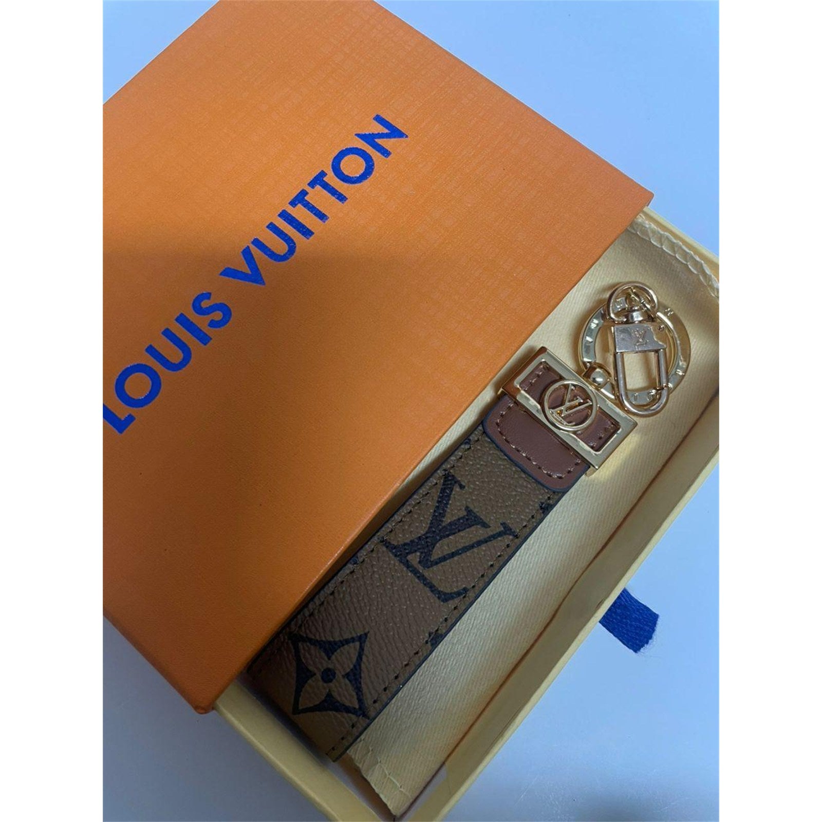 Louis Vuitton Dragonne Key Holder Reverse Monogram Brown with Dust Bag – Authentic Pre-Owned