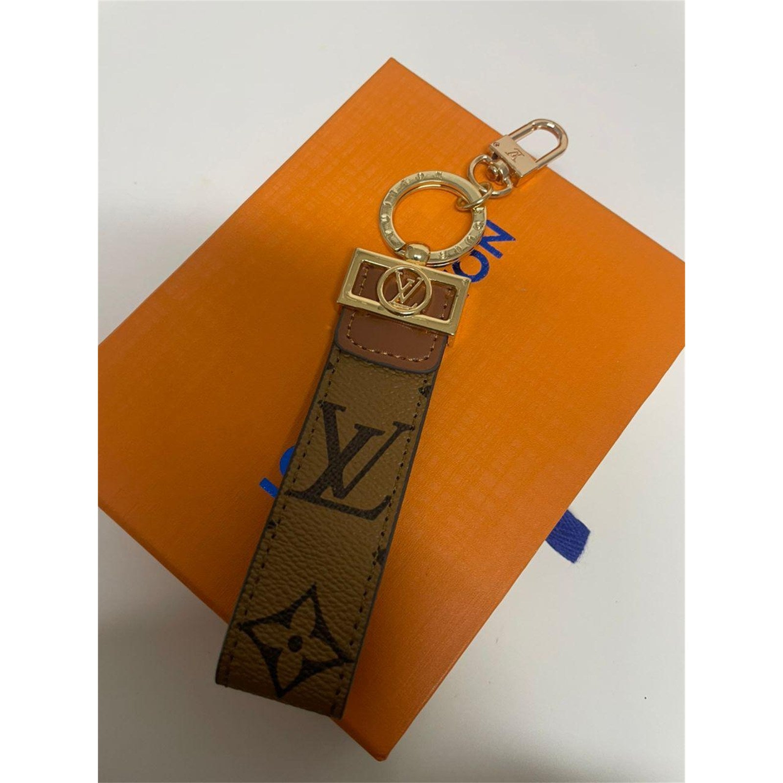 Louis Vuitton Dragonne Key Holder Reverse Monogram Brown with Dust Bag – Authentic Pre-Owned