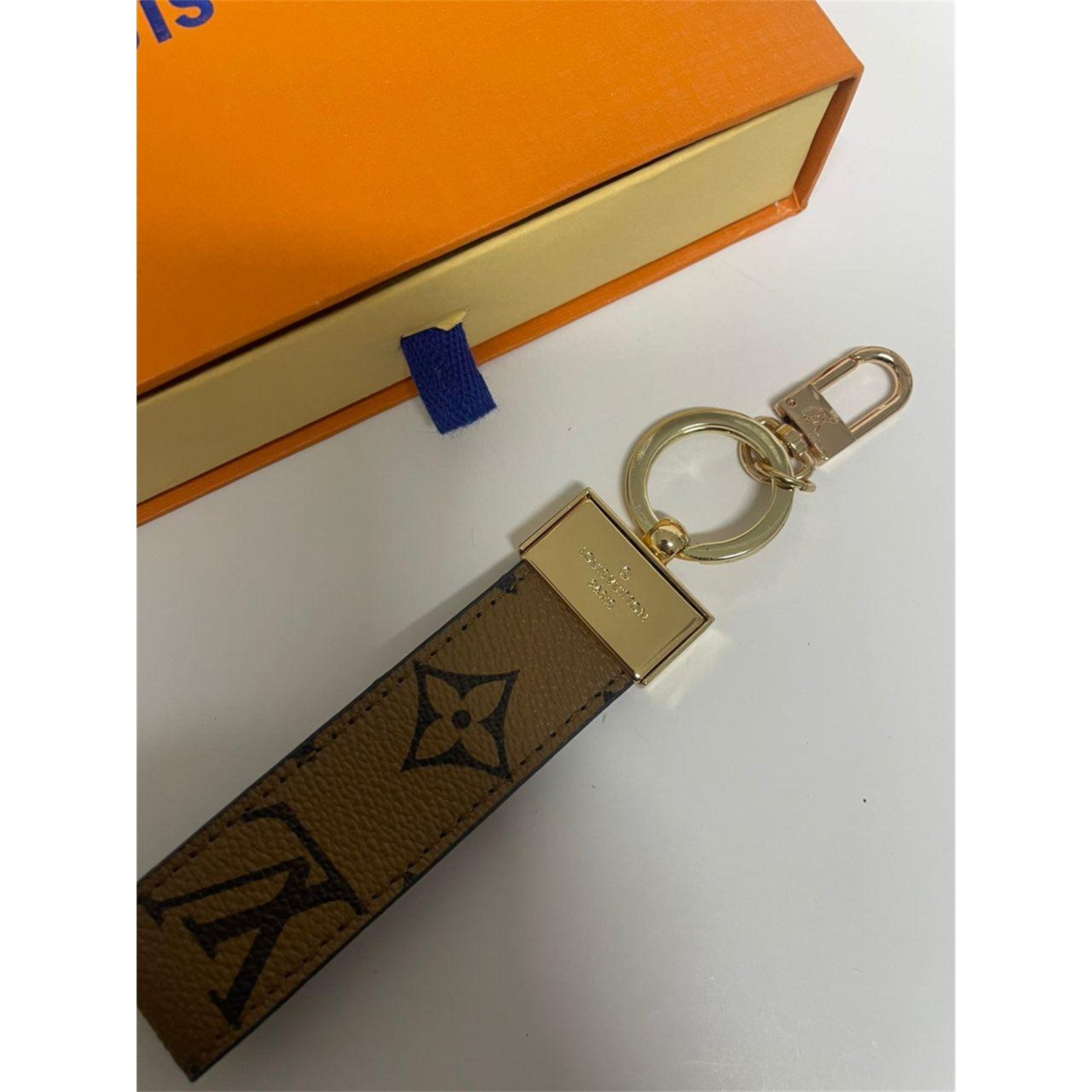 Louis Vuitton Dragonne Key Holder Reverse Monogram Brown with Dust Bag – Authentic Pre-Owned