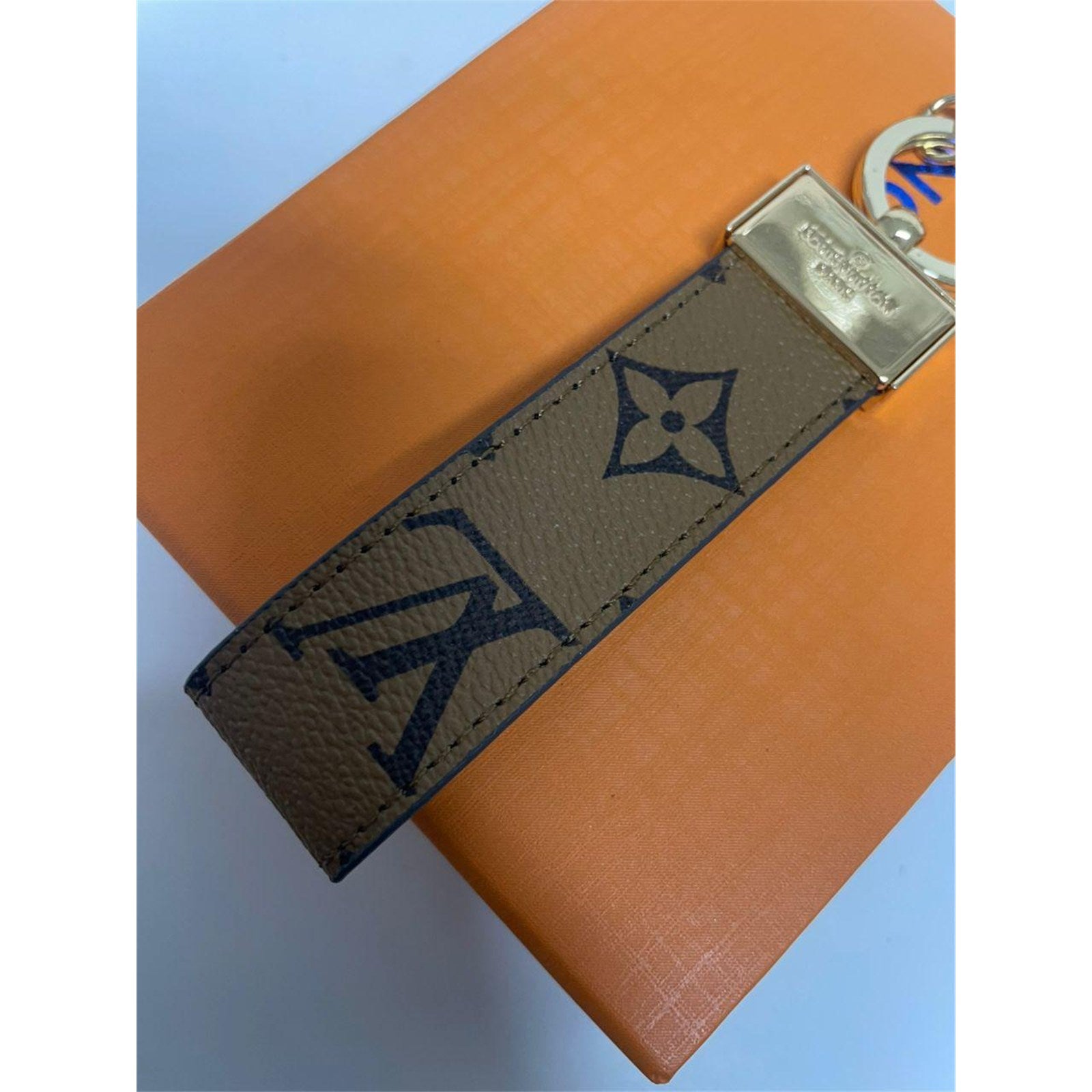 Louis Vuitton Dragonne Key Holder Reverse Monogram Brown with Dust Bag – Authentic Pre-Owned