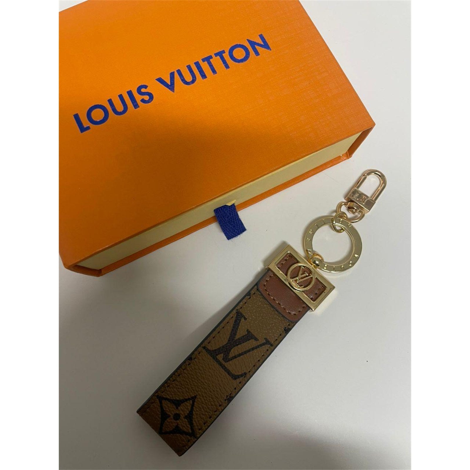 Louis Vuitton Dragonne Key Holder Reverse Monogram Brown with Dust Bag – Authentic Pre-Owned