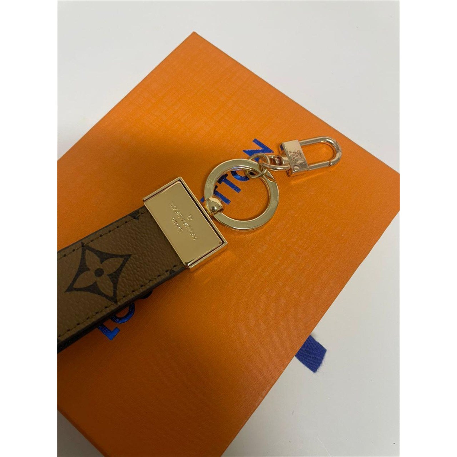 Louis Vuitton Dragonne Key Holder Reverse Monogram Brown with Dust Bag – Authentic Pre-Owned