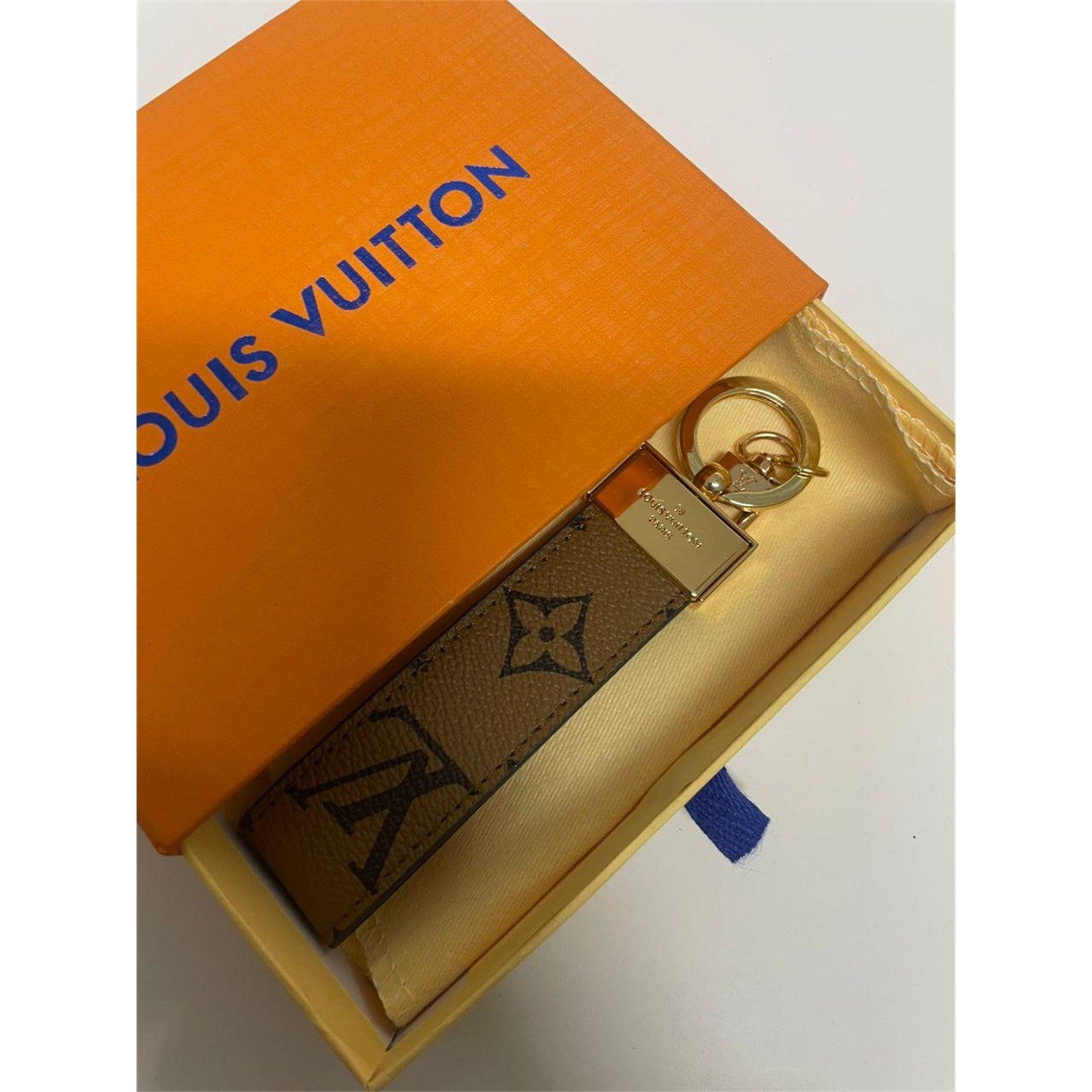 Louis Vuitton Dragonne Key Holder Reverse Monogram Brown with Dust Bag – Authentic Pre-Owned